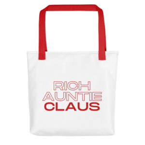 The Meet Rich Auntie Claus tote bag comes in a canvas fabric and features soft shell, denim tote handles, and the ‘Rich Auntie Claus’ graphic at front.