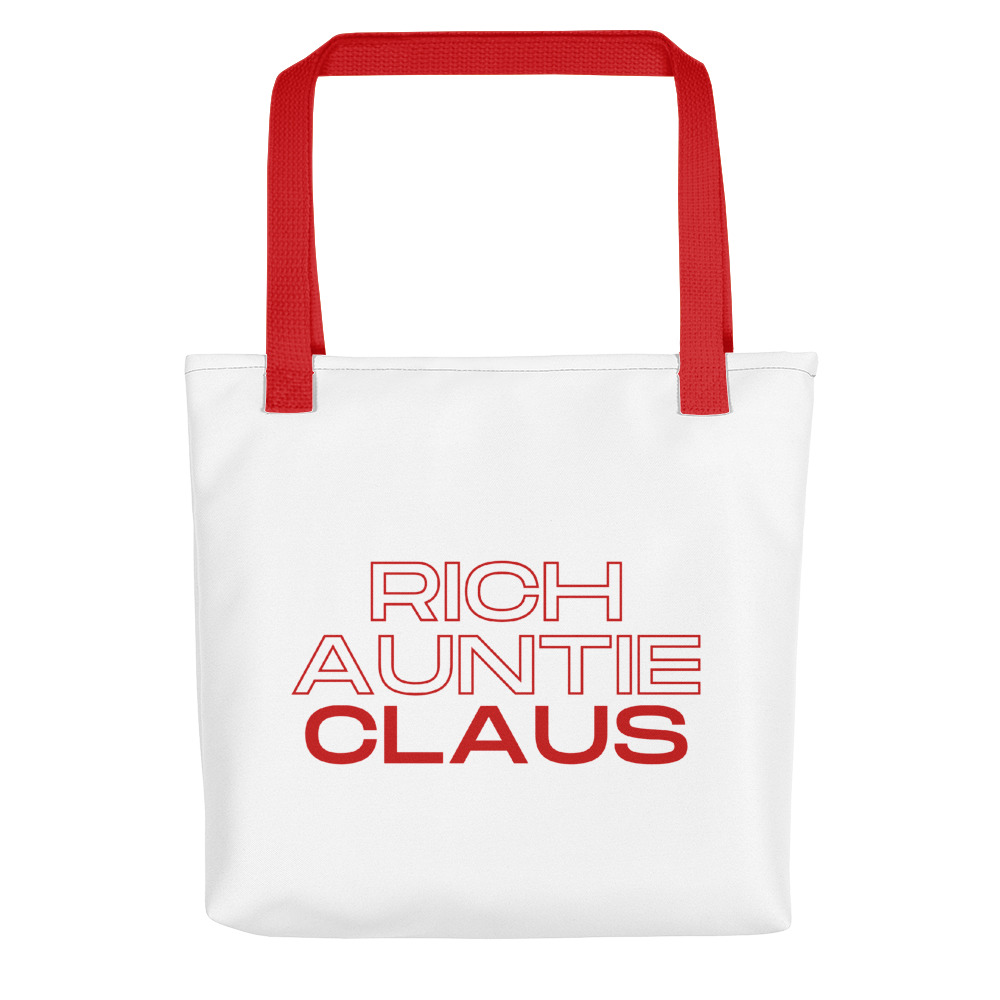 The Meet Rich Auntie Claus tote bag comes in a canvas fabric and features soft shell, denim tote handles, and the ‘Rich Auntie Claus’ graphic at front.